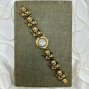 Rare Gold Slide Charm Cherub Watch with Mother of Pearl Heart Dial